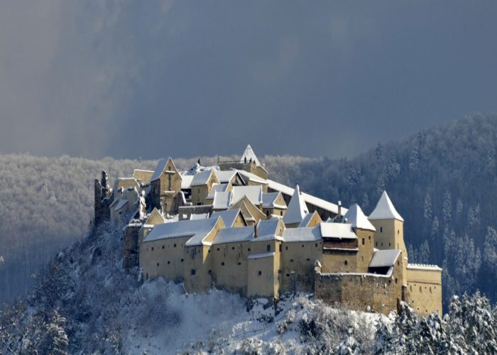 Rasnov Citadel In winter photo from air